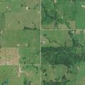 Trash fire spreads to pasture near Bluejacket