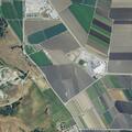 Grass fire near quarry possibly caused by shooting