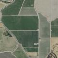 Vegetation and vehicle fire near Road 5 1/2 in Firebaugh