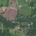 Four-acre grass fire behind house in Carthage