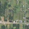 Caller reports man pointed gun during past commercial burglary
