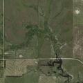 Semi-truck tires on fire near rural intersection