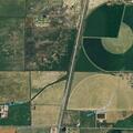 Pickup trucks with dirt bikes swerving near La Jara