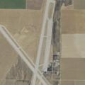 Suspicious person with shovel at airport facility
