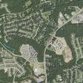 Person experiencing severe back pain at apartment complex