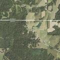 Woman injured after rolling riding lawnmower on herself