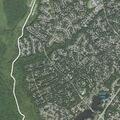 Person experiencing abdominal pain at Cottage Cove Drive