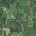 Farm baler on fire near Highway C in Charles