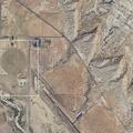 Person with broken knee and thumb at Escalante Airport