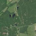 Brush fire burning in field near Peterson Avenue home