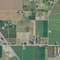 Black pickup stopped in highway center divide