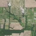 Brush fire from controlled burn spreads toward homes