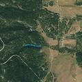 Small brush fire near residence on Highway 165