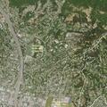 Person masturbating under blanket on Grand Avenue