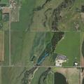 Caller reports possible gunshots in field near NW 30th St