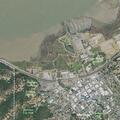 Hillside vegetation fire near rail yard in Martinez