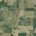 Brush fire spreads to storage barn near home