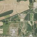 Caller reports coughing man in field on Kiwi Road