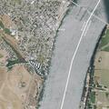 Elderly man falls into water at marina but holds boat