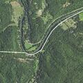 Person experiencing abdominal pain on Coal River Road