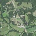 Man stuck in lift 40 feet high at Owensville address