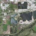 Grass fire reported in riverbed near Dike Road