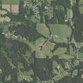Trespassing report with threats in wooded area