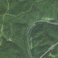 Unoccupied car fire spreads to hillside near Clay Trucking