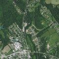 Person experiencing abdominal pain in Henryville