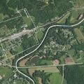 Man slumped over in wheelchair by roadside near campground