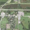 Vehicle damages yard fence and leaves scene