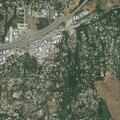Disabled car with flat tire near Highway 50
