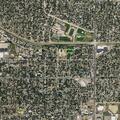 Officers monitor reports of roaming bear near business