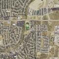 Vehicle hits mailbox and yard, blocks sidewalk