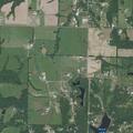 Boy with fish hook stuck in finger at backyard lake