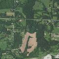 Large grass fire near homes in Bates City