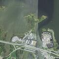 Person with leg injury on boat at docks in Grasonville