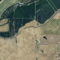 Structure fire threatening nearby vegetation