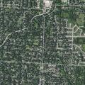 Person suffering from severe stomach pain at Raytown address