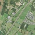 Caller reports repeated shotgun fire near Town Run Lane