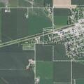 Unauthorized ditch dug in gravel road near cemetery