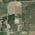 Combine on fire at rural property near county line