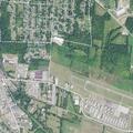 Person fallen near fence by airport on Ivy Lane