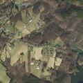Report of two people parachuting into a yard