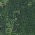 Woman reporting abdominal pain at Little Duck Creek Road