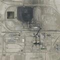 Person breathing with black vomit at power plant site