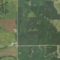 Field fire from burn pile near Nebo contained