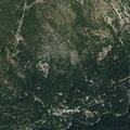 Small vegetation fire near Catfish Lake in timber