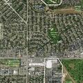 Person suffering abdominal pain at Aurora apartment
