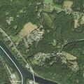 Neighbor burning tires near homes and tree line